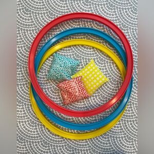 Lovevery bean bag toss ring game